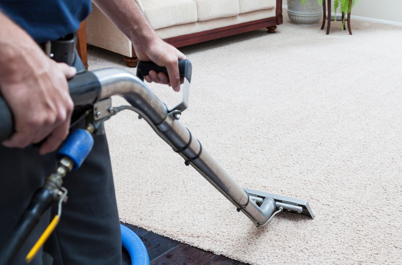 QBM Services using advanced equipment for deep carpet cleaning in Northern Utah, removing stains and allergens.