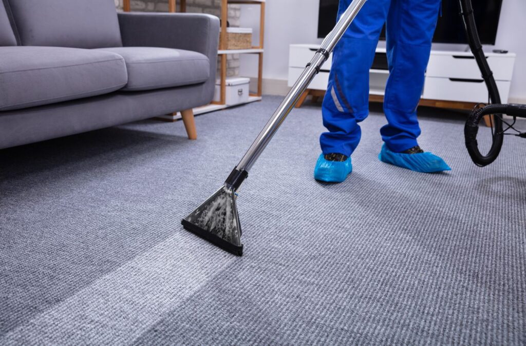 QBM Services team member providing professional carpet cleaning in Northern Utah for a fresh and clean environment.