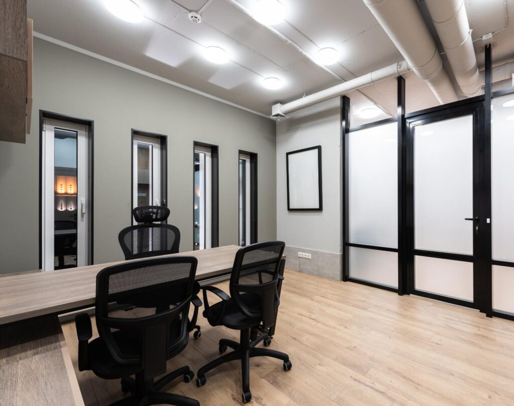 Office workspace in Clinton, UT being cleaned by a professional office cleaning team